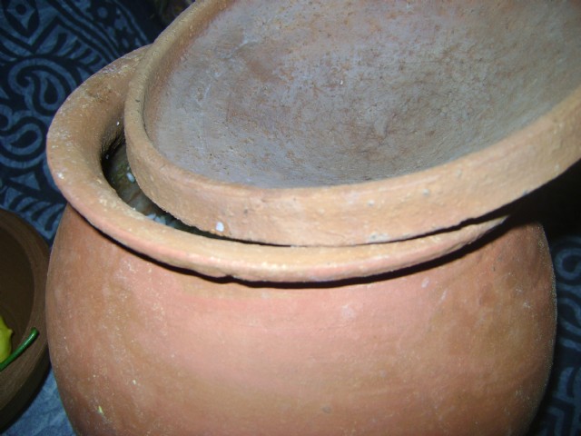 Earthen Cover And New Pot