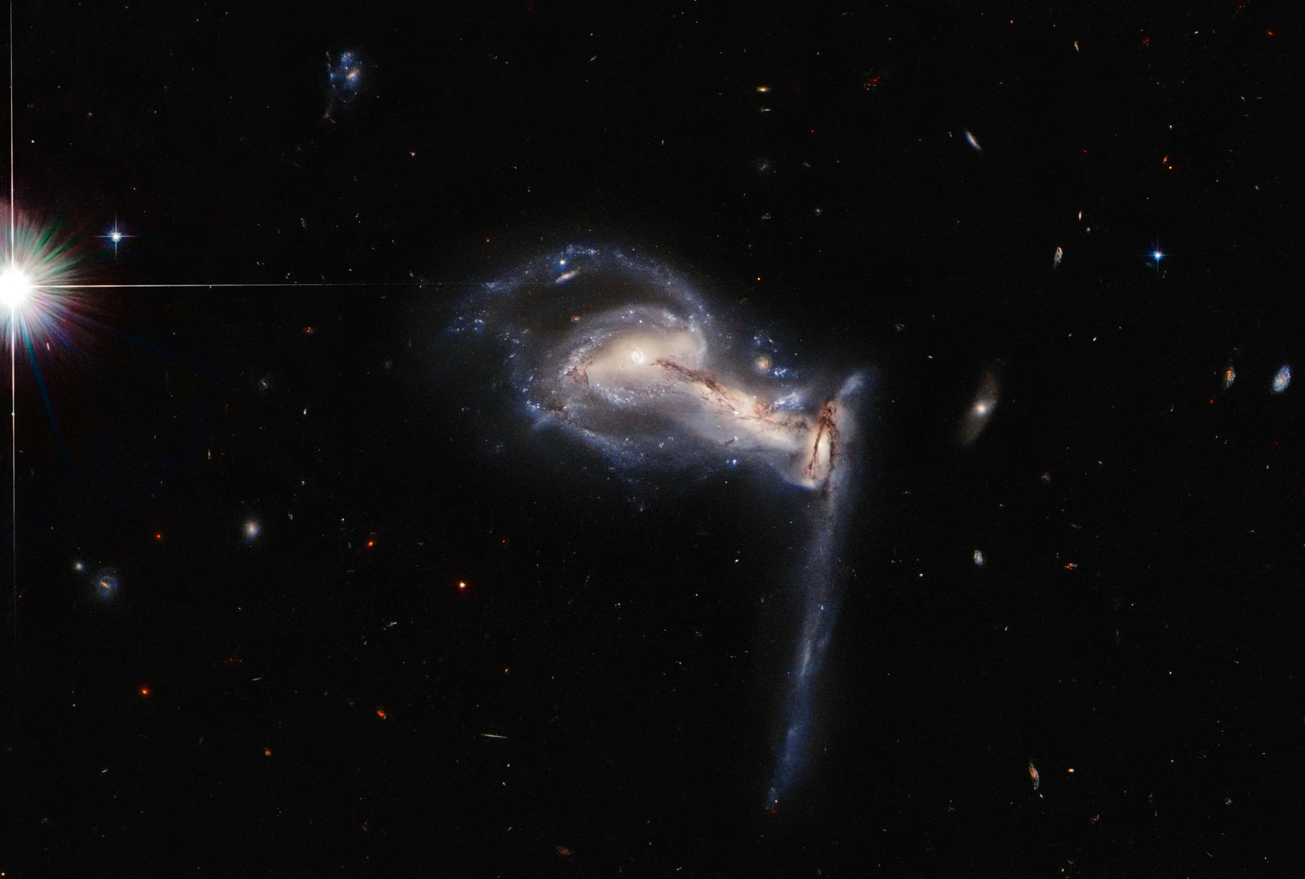 Tugging Triplet Galaxies