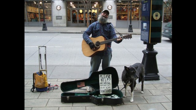 Street Man With His Guitar