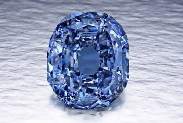 I Am Sitting Near A Blue Sapphire,