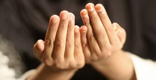 Mothers' Faces From Behind The Jars